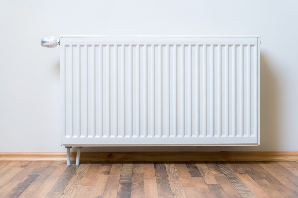 white radiator on wall