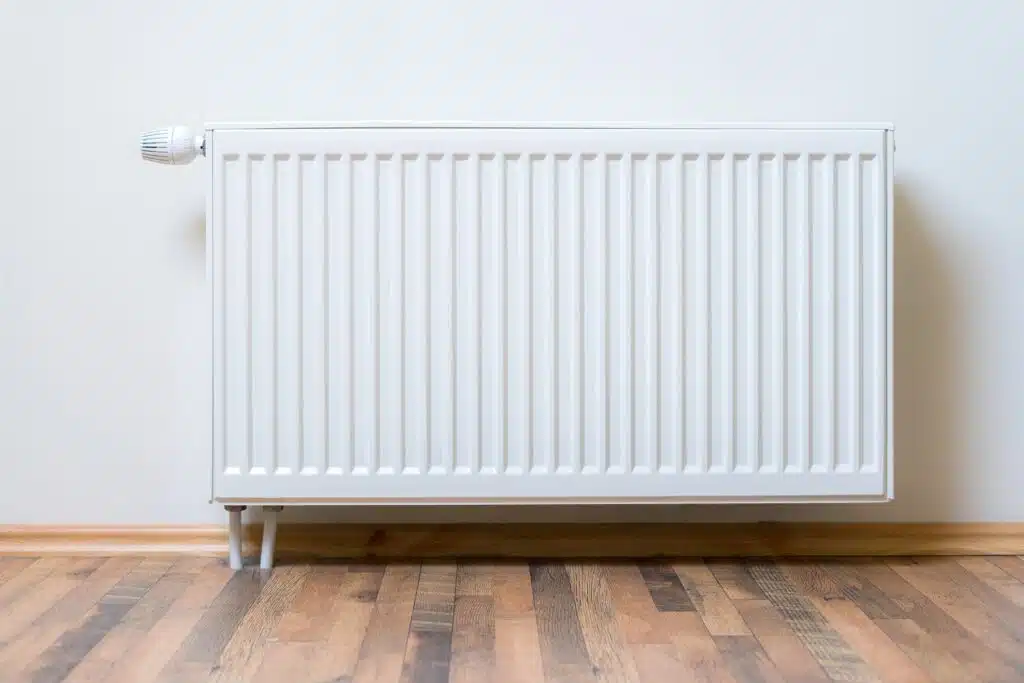white radiator on wall
