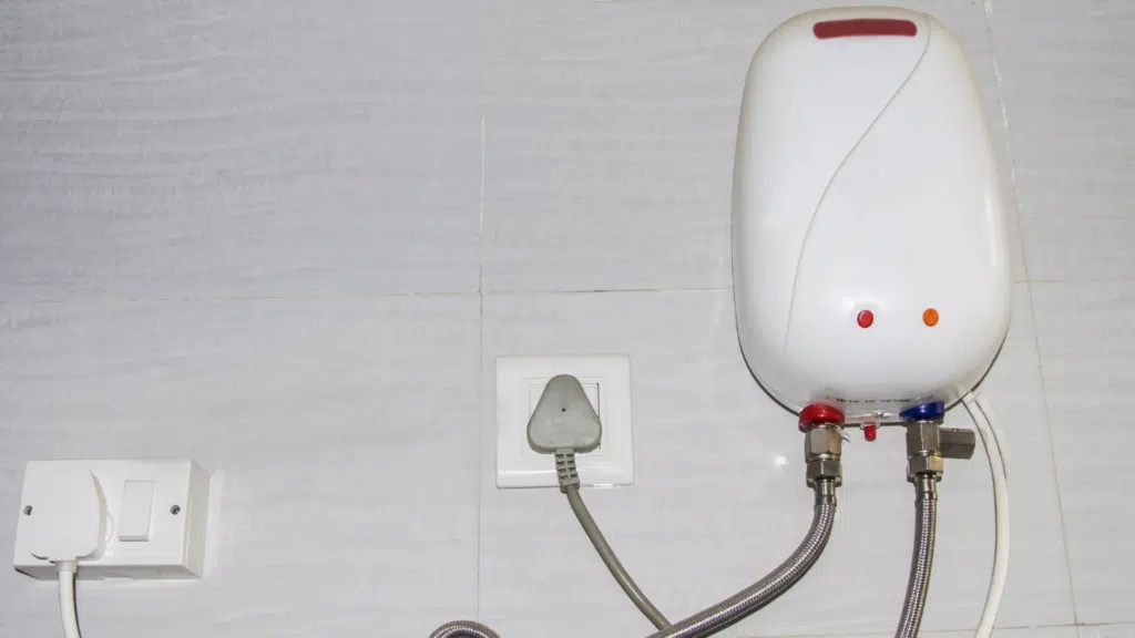 white oil boiler water heater on wall